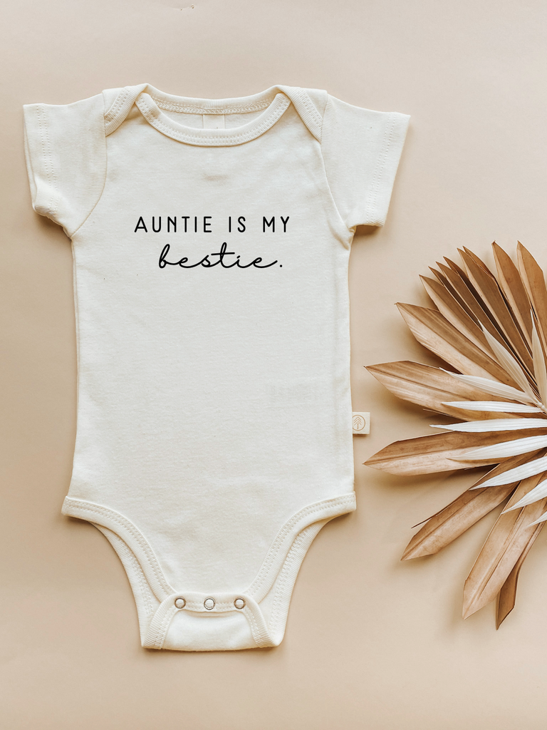 organic cotton short sleeve bodysuit with auntie is my bestie graphic made in usa perfect for new baby baby shower gift for sister aunt onzie onsie onesie tenth and pine