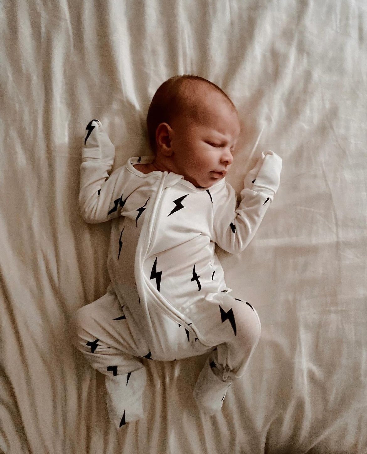 Bamboo Zip Pajamas | White &amp; Black Lightning Bolt - Tenth &amp; Pine - Newborn