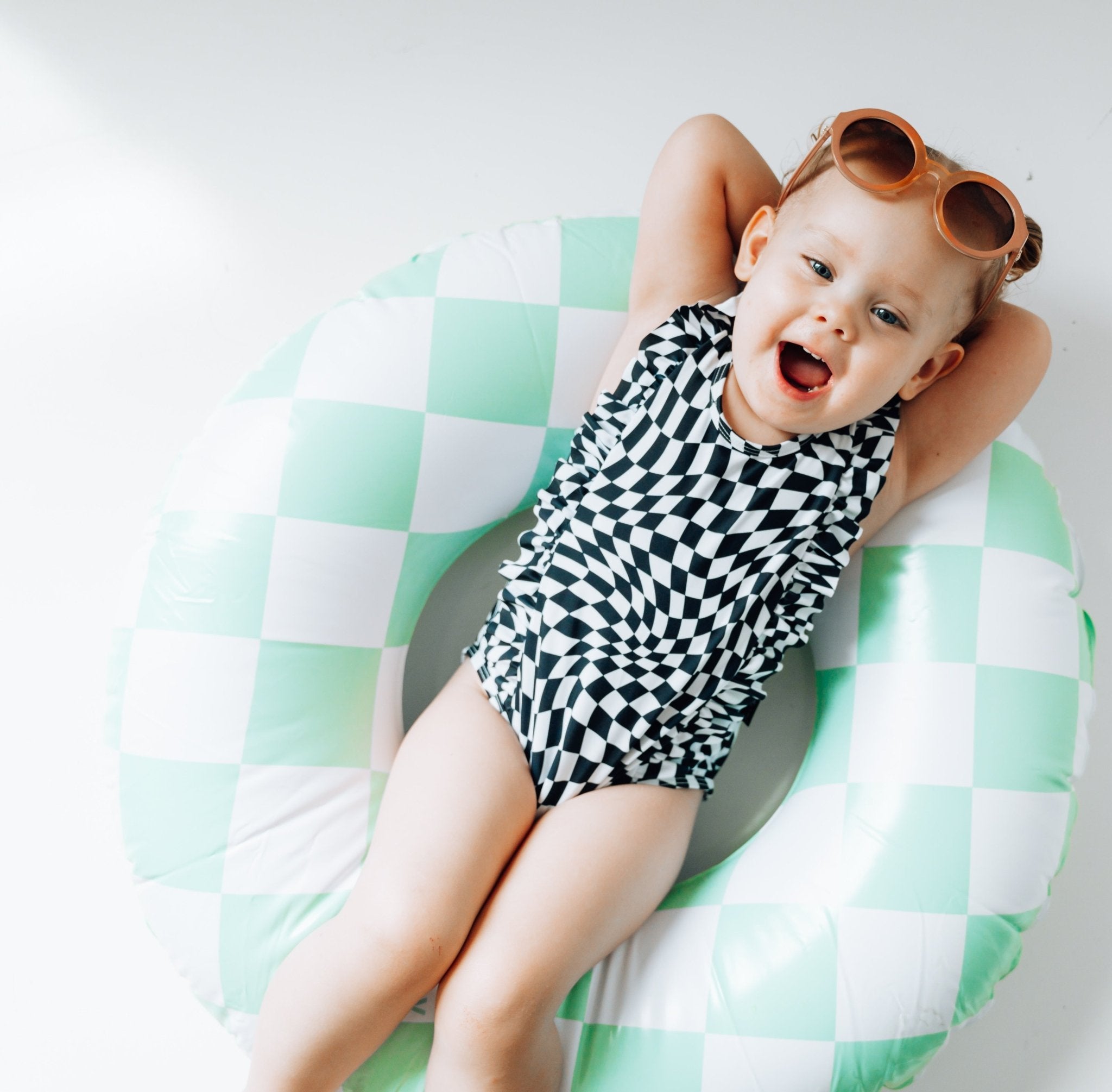 RUFFLE SWIMSUIT - Black Dizzy Check - Tenth &amp; Pine - Ruffle Swimsuit - 6/12m - millie + roo
